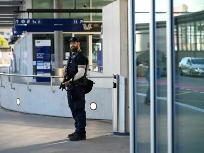 A police officer stands near the site of a deadly shooting at an event, according to the police, at a train station in Aarau, Switzerland, August 30, 2026. REUTERS/Romina Amato