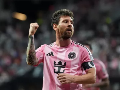 Inter Miami forward Lionel Messi celebrates after scoring his side's third goal during the second half of an MLS soccer match against CF Montreal, Saturday, Aug. 29, 2026, in Miami. (AP Photo/Rebecca Blackwell)