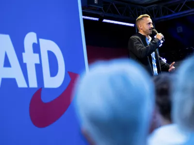 FILE PHOTO: Ulrich Siegmund, top candidate of the far-right Alternative for Germany (AfD) party, speaks on stage during a campaign rally ahead of Germany's Saxony-Anhalt state election, in Naumburg, Germany August 24, 2026. REUTERS/Annegret Hilse/File Photo