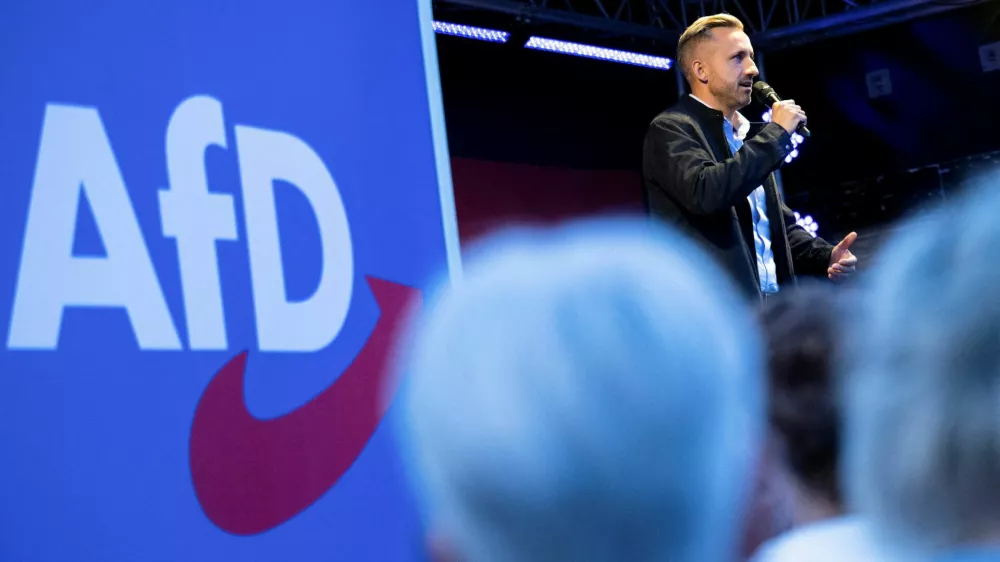 FILE PHOTO: Ulrich Siegmund, top candidate of the far-right Alternative for Germany (AfD) party, speaks on stage during a campaign rally ahead of Germany's Saxony-Anhalt state election, in Naumburg, Germany August 24, 2026. REUTERS/Annegret Hilse/File Photo