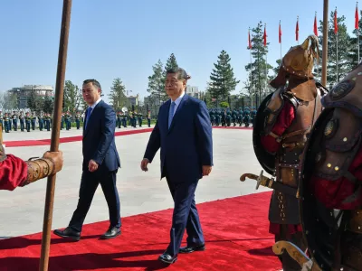 Kyrgyz President Sadyr Zhaparov, left, and Chinese President Xi Jinping attend a welcoming ceremony at the Yntymak Ordo state residence in Bishkek, Kyrgyzstan, Monday, Aug. 31, 2026. (AP Photo/Vladimir Voronin)