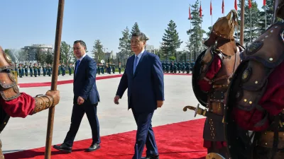 Kyrgyz President Sadyr Zhaparov, left, and Chinese President Xi Jinping attend a welcoming ceremony at the Yntymak Ordo state residence in Bishkek, Kyrgyzstan, Monday, Aug. 31, 2026. (AP Photo/Vladimir Voronin)