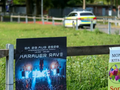 A poster for the rave party on display near the Schachen horse racing track, following a deadly shooting incident at a rave party on Sunday, in Aarau, Switzerland, August 31, 2026. REUTERS/Denis Balibouse