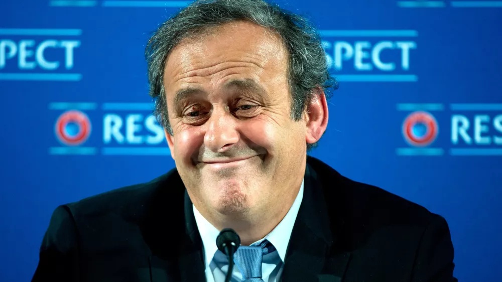 FILED - 22 February 2014, France, Nice: Then UEFA president Michel Platini speaks during a press conference. FIFA's governance committee has recommended that world football's governing body take former top officials Joseph Blatter and Michel Platini to court to recover 2 million Swiss francs (2 million dollars), documents seen by dpa showed on Wednesday. Photo: Federico Gambarini/dpa