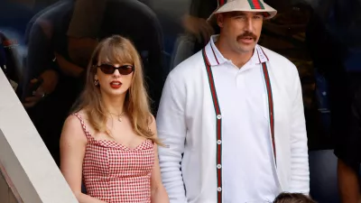 FILE PHOTO: Tennis - U.S. Open - Flushing Meadows, New York, United States - September 8, 2024 Singer Taylor Swift and Kansas City Chiefs' Travis Kelce are seen during the final match between Italy's Jannik Sinner and Taylor Fritz of the U.S. REUTERS/Eduardo Munoz/File Photo