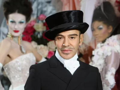 FILE - Fashion designer John Galliano poses at the end of the presentation of the Dior Haute Couture spring/summer 2010 fashion collection on Jan. 25, 2010, in Paris. (AP Photo/Jacques Brinon, File)