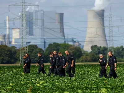German police officers search a field near a power plant after a second sabotage attempt on Germany's electricity grid, with local police saying they are investigating an attack on a substation in Bergheim, Germany, September 2, 2026. REUTERS/Thilo Schmuelgen