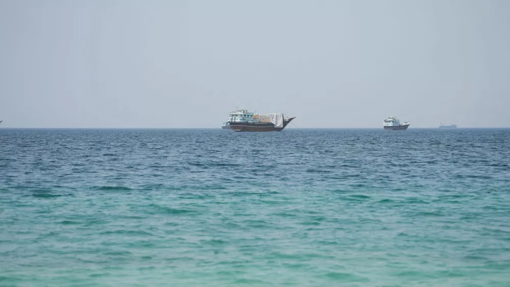 Vessels near the Strait of Hormuz, as seen from Musandam, Oman, August 6, 2026. REUTERS/Stringer