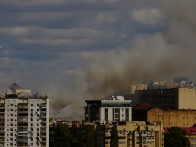Smoke rises after a Russian drone attack in downtown Kyiv, Wednesday, Sept. 2, 2026. (AP Photo/Francisco Seco)