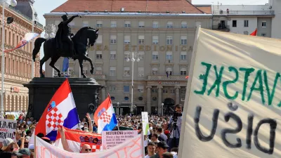 Thousands of people rally in protest over the discovery of illegally imported and disposed waste, including hazardous and toxic materials, in downtown Zagreb, Croatia, Saturday, Sept. 5, 2026. (AP Photo)