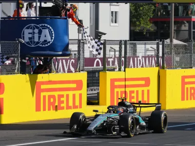 Mercedes driver Andrea Kimi Antonelli of Italy crosses the finish line to win the Italian Formula One Grand Prix race, in Monza, Italy, Sunday, Sept. 6, 2026. (AP Photo/Antonio Calanni)