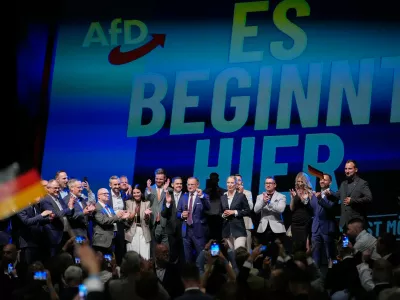 Top candidate Ulrich Siegmund and party leaders Tino Chrupalla and Alice Weidel, speak to party members in front of a reading "it starts here" at an election party of the "Alternative for Germany" (AfD) after the Saxony-Anhalt state elections in Magdeburg, eastern Germany, Sunday, Sept. 6, 2026. (AP Photo/Matthias Schrader)