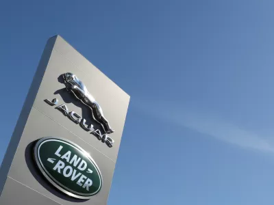 FILE PHOTO: Logos of Jaguar and Land-Rover are seen outside a car dealer, in Brussels, Belgium May 28, 2020. REUTERS/Yves Herman/File Photo