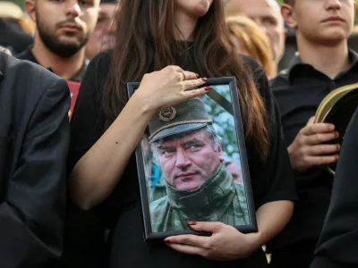 People attend a funeral of former Bosnian Serb wartime general Ratko Mladic at the Topcider Cemetery in Belgrade, Serbia, September 7, 2026. REUTERS/Zorana Jevtic