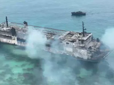 In this image taken from video provided by the Philippine Coast Guard, remains of ferry MV June Aster that caught fire off Palawan province, western Philippines on Thursday Sept. 10, 2026. (Philippine Coast Guard via AP)