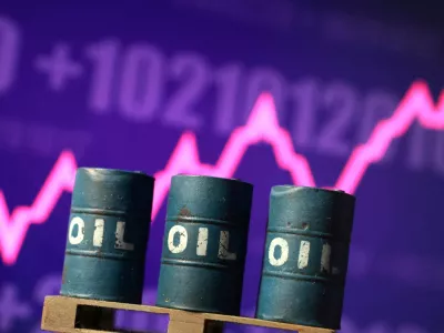 FILE PHOTO: 3D printed oil barrels and rising stock graph are seen in this illustration taken March 23, 2026. REUTERS/Dado Ruvic/Illustration/File Photo