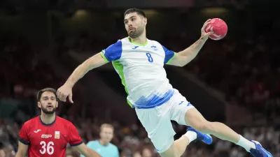 Slovenia's Blaz Janc is in action during the bronze medal handball match between Spain and Slovenia at the 2024 Summer Olympics, Sunday, Aug. 11, 2024, in Villeneuve-d'Ascq, France. (AP Photo/Brian Inganga)