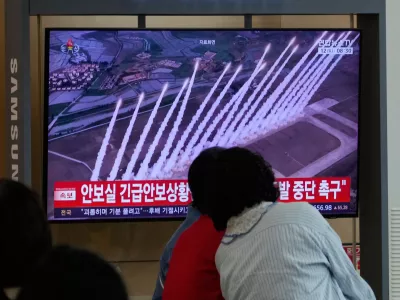 A TV screen shows a file photo of a North Korean missile launch during a news program at Seoul Railway Station in Seoul, South Korea, Saturday, Sept. 12, 2026. (AP Photo/Ahn Young-joon)