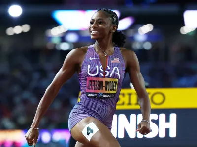 Athletics - 2026 World Athletics Ultimate Championships - National Athletics Centre, Budapest, Hungary - September 12, 2026 Melissa Jefferson-Wooden of the U.S. celebrates as she crosses the line to win the Women's 100m final REUTERS/Bernadett Szabo