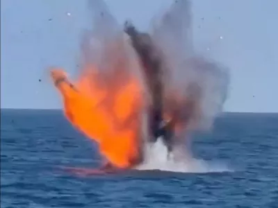 An explosion of what Romanian Defence Minister Radu Miruta said was one of two Gerbera-type drones drifting in Romania's Black Sea exclusive economic zone near the offshore gas project Neptun Deep, in this frame taken from a handout video released on August 11, 2026. Radu Miruta via Facebook/Handout via REUTERS THIS IMAGE HAS BEEN SUPPLIED BY A THIRD PARTY. NO RESALES. NO ARCHIVES