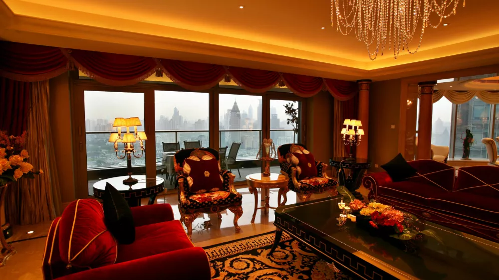 A general view shows the Huangpu River and its high raised buildings along the bank, out of the living room of an apartment at the Tomson's Riviera project in Shanghai July 19, 2006. Nine months after opening in Shanghai, China's most expensive luxury apartment complex has yet to attract a single buyer, but developer Tomson Group Ltd. is not about to slash prices to get people in. The development's 220 luxury apartments now carry price tags averaging 110,000 yuan ($13,750) per square metre ($1,275 per square foot). REUTERS/Nir Elias (CHINA)