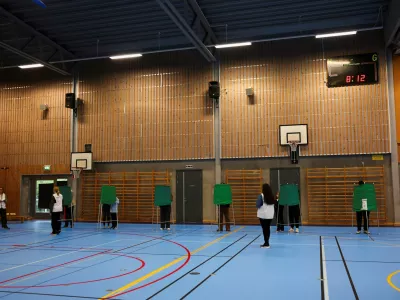 People vote at a polling station during the general election in Nacka, near Stockholm, Sweden, September 13, 2026. REUTERS/Denis Balibouse