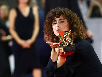 May el-Toukhy, winner of the Golden Lion Award for Best Film for the movie "Woman Unknown", poses during the closing ceremony of the 83rd Venice International Film Festival, Italy, September 12, 2026. REUTERS/Yves Herman