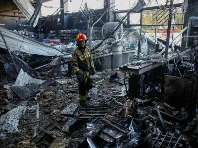 A firefighter inspects the site of a supermarket hit by a Russian drone strike, amid Russia's attack on Ukraine, in Chernihiv, Ukraine July 26, 2026. REUTERS/Maksym Kishka