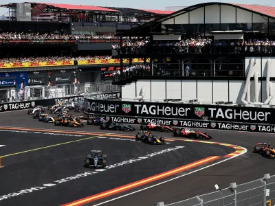Formula One F1 - Spanish Grand Prix - Madring, Madrid, Spain - September 13, 2026 McLaren's Lando Norris leads into the first corner at the start of the race ahead of Mercedes' Andrea Kimi Antonelli REUTERS/Jakub Porzycki   TPX IMAGES OF THE DAY