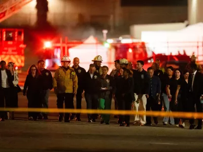 Los Angeles Mayor Karen Bass joined by other officials walk to a news conference near the scene of a helicopter crash in Chatsworth, a neighborhood in Los Angeles, Tuesday, Sept. 15, 2026. (AP Photo/Ethan Swope)