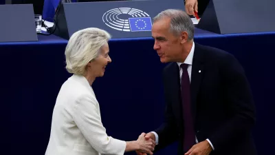 Canadian Prime Minister Mark Carney shakes hands with European Commission President Ursula von der Leyen as he attends her State of the European Union address (SOTEU) to the European Parliament, in Strasbourg, France, September 16, 2026. REUTERS/Yves Herman