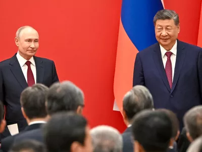 Russian President Vladimir Putin, left, and Chinese President Xi Jinping attend an opening ceremony of the China-Russia Years of Education at the Great Hall of the People in Beijing, Wednesday, May 20, 2026. (Kristina Solovyova, Sputnik, Kremlin Pool Photo via AP)