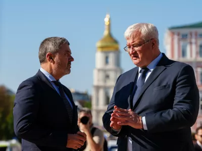 Slovenian Foreign Minister Tone Kajzer, left, and Ukrainian Foreign Minister Andrii Sybiha speak at Saint Michael's Square in Kyiv, Ukraine, on Thursday, September 17, 2026. (AP Photo/Evgeniy Maloletka)