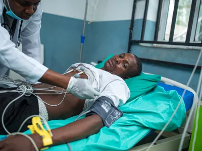 A doctor attends to a victim of a locally brewed alcoholic concoction commonly known as "Monkey Tail" at a hospital in Odigbo southern Nigeria, Thursday, Sept. 17, 2026. (AP Photo/Dapo Alley)