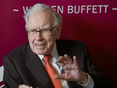 FILE - Warren Buffett, chairman and CEO of Berkshire Hathaway, speaks during a game of bridge following the annual Berkshire Hathaway shareholders meeting May 5, 2019, in Omaha, Neb. (AP Photo/Nati Harnik, File)