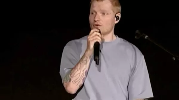 Singer Ed Sheeran speaks on stage as he addresses a controversy over Macklemore being pulled from the tour after saying "Free Palestine" at a show early this month, in Philadelphia, Pennsylvania, US September 19, 2026, in this screen grab obtained from a video. Ed Sheeran via Instagram/Handout via REUTERS THIS IMAGE HAS BEEN SUPPLIED BY A THIRD PARTY. NO RESALES. NO ARCHIVES. MANDATORY CREDIT.   TPX IMAGES OF THE DAY