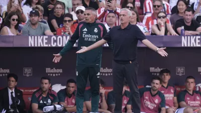 Real Madrid's head coach Jose Mourinho, right, gestures during a Spanish La Liga soccer match between Atletico Madrid and Real Madrid in Madrid, Sunday, Sept. 20, 2026. (AP Photo/Bernat Armangue)