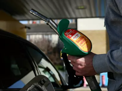 FILE PHOTO: A motorist returns the petrol pump after filling their car with fuel at a petrol station, as the price of oil and gas has surged amid the conflict in the Middle East, in London, Britain, March 5, 2026 REUTERS/Jack Taylor/File Photo
