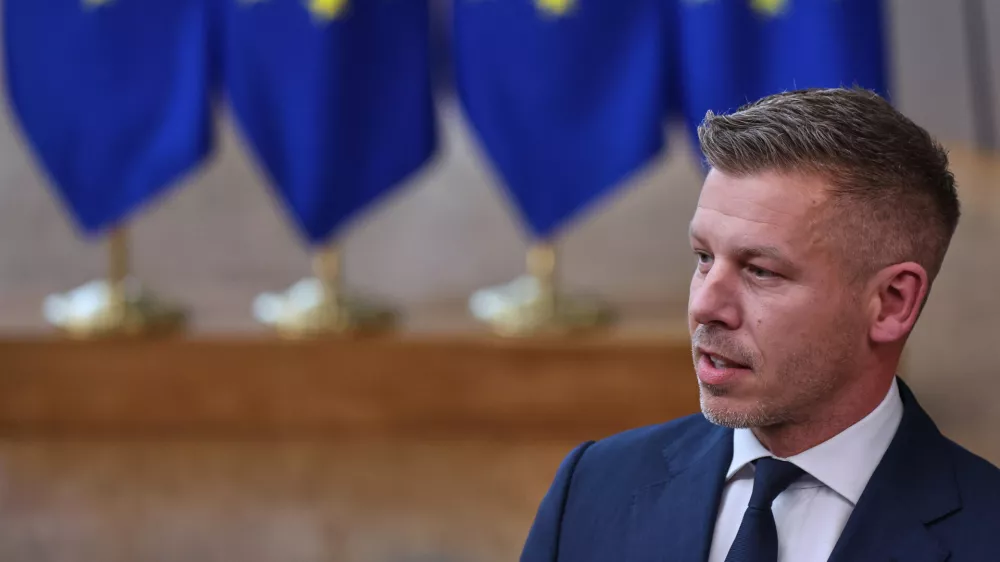 Hungary's Prime Minister Peter Magyar talks to journalists as he arrives for the EU summit in Brussels, Thursday, June 18, 2026. (AP Photo/Omar Havana)