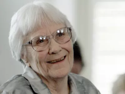 FILE - In this Aug. 20, 2007, file photo, author Harper Lee smiles during a ceremony honoring the four new members of the Alabama Academy of Honor at the Capitol in Montgomery, Ala. Harper Lee, the elusive author whose "To Kill a Mockingbird" became an enduring best seller and classic film with its child's-eye view of racial injustice in a small Southern town, has died according to Harper Collins spokeswoman Tina Andreadis. She was 89. (AP Photo/Rob Carr, File)