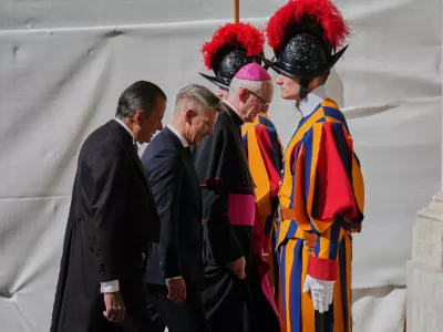Hungary's Prime Minister Peter Magyar, second from left, arrives in the St. Damasus Courtyard to meet with Pope Leo XIV, at the Vatican on Thursday, Sept. 24, 2026. (AP Photo/Andrew Medichini)
