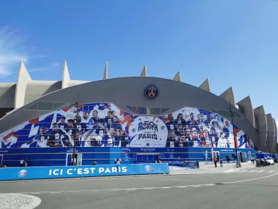 July 7, 2023. Paris, France. Main facade of Parc des Princes stadium decorated with PSG player graphics featuring Kylian Mbappe, Lionel Messi and other members of the 2022-2023 squad.
