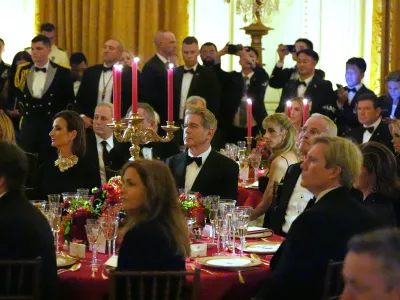 Treasury Secretary Scott Bessent and other guests listen as President Donald Trump hosts a State Dinner for China's President Xi Jinping in the East Room of the White House, Thursday, Sept. 24, 2026, in Washington. (AP Photo/Alex Brandon)