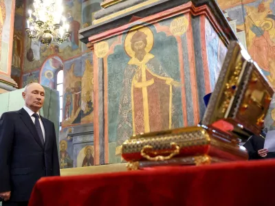 FILE PHOTO: Russian President Vladimir Putin stands by the relics of the Holy Grand Prince Dmitry Donskoy, which were discovered in the course of restoration works, during a service at the Archangel Cathedral of the Kremlin in Moscow, Russia August 20, 2026. Sputnik/Vyacheslav Prokofyev/Pool via REUTERS ATTENTION EDITORS - THIS IMAGE WAS PROVIDED BY A THIRD PARTY./File Photo