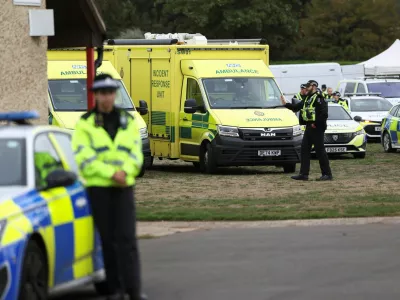 Emergency vehicles are parked at Fairford Youth Football club, near RAF Fairford, which hosts US Air Force personnel, in Fairford, Gloucestershire, Britain, September 27, 2026. Police declared a major incident at UK's Fairford air base after several men were arrested on suspicion of offences under the Explosives Act. REUTERS/Toby Shepheard