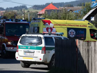Ambulances are parked near the primary school building following a stabbing attack by a pupil in Staskov, Slovakia, Tuesday, Sept. 29, 2026. (Daniel Stehlik/TASR via AP)
