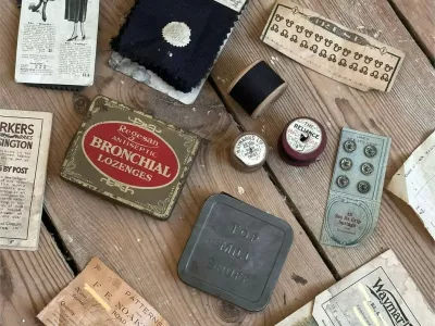 Story from Jam Press (Victorian Time Capsule)Pictured: The 100-year-old haul hidden beneath Ema's floorboards.Couple find 100-year-old TIME CAPSULE under Victorian home floorboardsA couple renovating their Victorian home were stunned to discover a 100-year-old haul hidden beneath the floorboards.Ema Mestrovic couldn't believe her eyes when she uncovered a collection of items dating back to 1921.The 35 year old made the discovery while renovating the home she bought with her partner.The couple were trying to reach some pipework when lifting a floorboard revealed the historic stash.Among the items were fabric samples, sewing supplies, old adverts, a snuff tin and a pattern ticket."You never really know what you're going to find when you start lifting floorboards and opening things up," Ema, from Kent, told NeedToKnow."We weren't specifically looking for anything, it was one of those completely unexpected discoveries that you come across when you start opening up an old house."It was such a surreal moment."We knew buying a Victorian house meant there would be plenty of history, but actually finding something that had been left there over 100 years ago was completely unexpected."Ema and her partner bought the property in October 2025 with plans to transform it into their dream home.But the fascinating discovery temporarily brought renovations to a halt as the couple tried to work out who the items had belonged to.Ema, a digital product designer, said: "There are actually some clues that suggest the items were connected to a local business that worked at our house."One of the items appears to have the address of the property on it, which makes me think it may have belonged to a tradesperson who worked here at the time."I immediately started wondering who had used them, why they were left there and what the house was like when these items were originally being used."It makes you look at the house slightly differently, knowing that someone was standing in the same rooms over 100 years ago."Rather than hiding the pieces away again, Ema now plans to put them on display in the renovated home.She added: "I'm definitely going to frame the pieces since it's a pretty special piece of house history."One of the things I love about renovating an old house is discovering these little pieces of its history."This was definitely one of the most unexpected discoveries we've made so far."ENDSEDITOR'S NOTE: Exclusive Licence: An exclusive licence has been obtained directly from the verified copyright holder. Jam Press holds exclusive distribution rights for the agreed content within the terms of the contributor agreement.,Image: 1137197613, License: Rights-managed, Restrictions: EDITOR'S NOTE: Exclusive Licence: An exclusive licence has been obtained directly from the verified copyright holder. Jam Press holds exclusive distribution rights for the agreed content within the terms of the contributor agreement., Model Release: no 