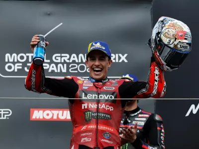 MotoGP - Japanese Grand Prix - Twin Ring Motegi, Motegi, Japan - October 4, 2026 Ducati Lenovo Team's Marc Marquez celebrates on the podium after winning the race REUTERS/Androniki Christodoulou   TPX IMAGES OF THE DAY