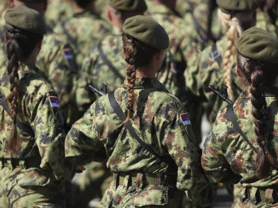 Serbian Army soldiers perform during a military parade in Belgrade, Serbia, Saturday, Sept. 20, 2025. (AP Photo/Darko Vojinovic)