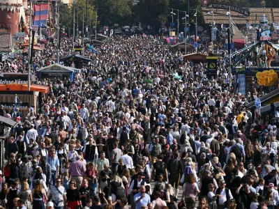 People gather on the last day of the 191st Oktoberfest, the world's largest beer festival in Munich, Germany, October 4, 2026. REUTERS/Angelika Warmuth